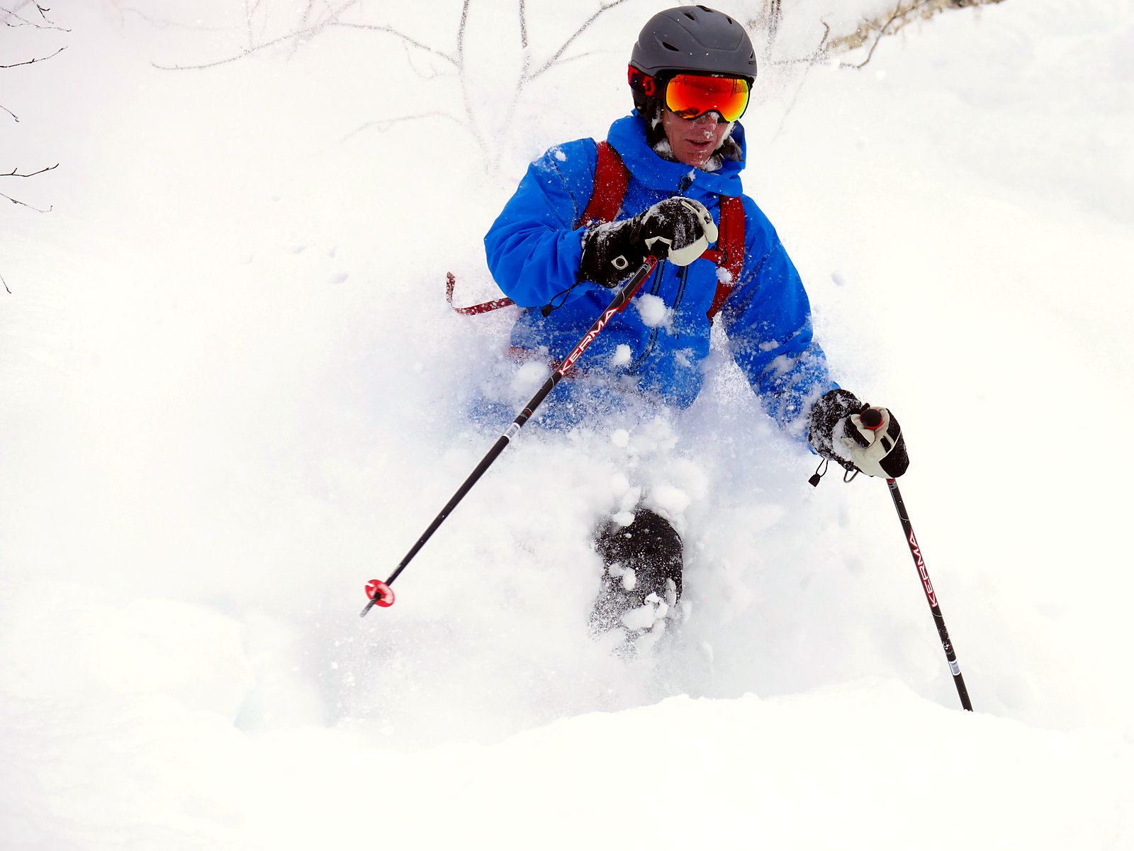 Deep powder face shot skiing in the Valais