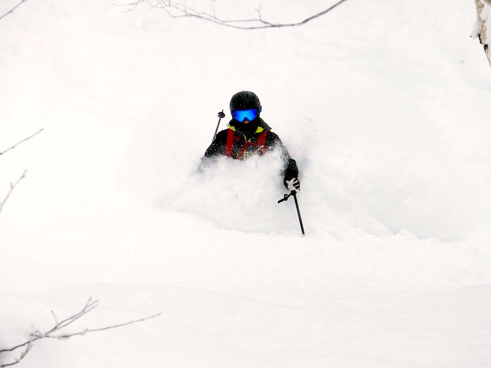 Powder skiing on an open slope in the Valais